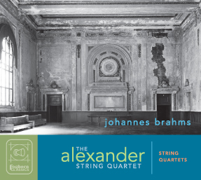 Black and white interior of a Beaux-Arts building shows the rich textures of decaying ornamentation (the former 16th Street train station in Oakland, California was used from 1912 to 1994).